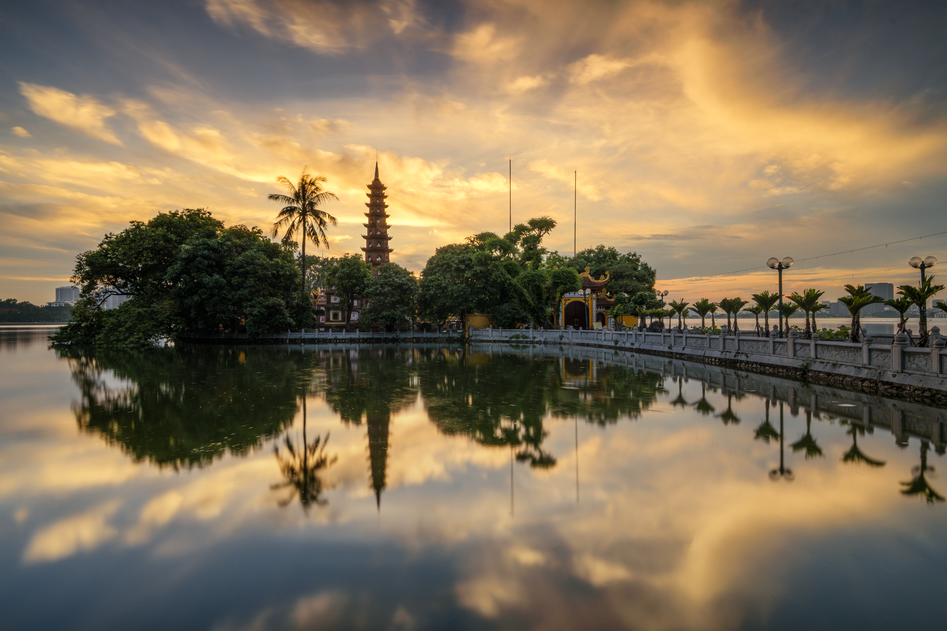 sunset view of tran quoc pagoda in hanoi vietnam